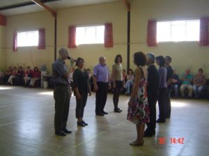 Pat Murphy teaching set dancing in Castletown. The demonstration set features Italian, Northern-Irish, French and German advanced dancers.